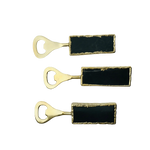Set of 3 black agate bottle openers in a column with gold opener heads and large rectangular black stone handles