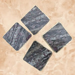 Lepidolite agate coaster set of 4, four diamond-arranged gray-purple square coasters with silver edges and purple speckling