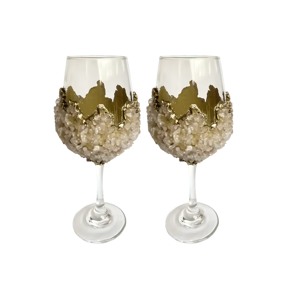 Two rose quartz wine glasses side by side, pale quartz crystal clusters wrapping bowl, jagged gold crown rim, clear stem and base
