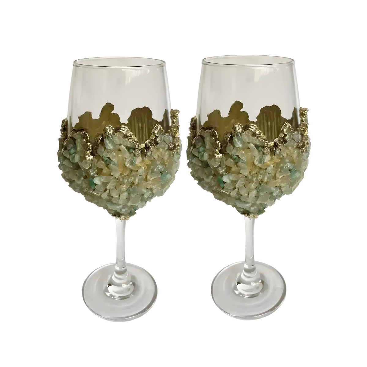 Two wine glasses with clustered light green quartz chips encrusting bowl, gold scalloped crown rim, on grey background