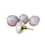 Three pale pink rose quartz knobs, gold rim, one showing brass screw stem — overview with hardware