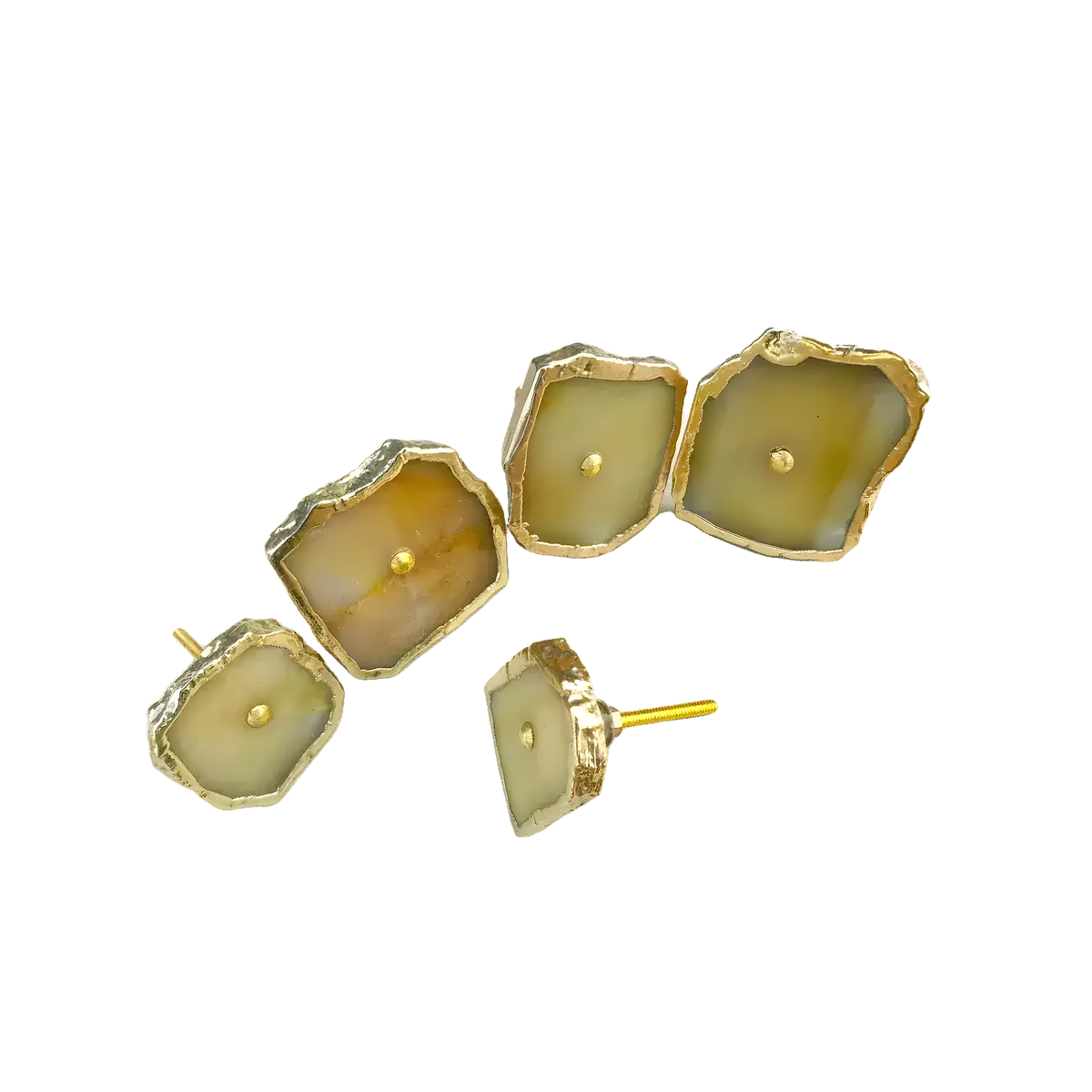 Five mustard agate cabinet knobs scattered showing warm olive-yellow stone faces with gold rims, one showing mounting screw