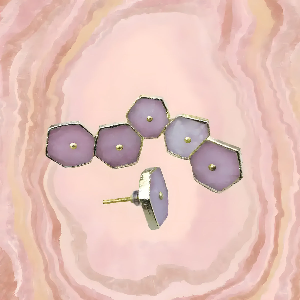 Six rose quartz hexagonal cabinet pulls in lavender-pink tones, on a swirling pink agate background, one showing the screw.