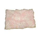 Overhead of large rose quartz agate cheese platter tray — soft blush pink rectangular stone slab with rough jagged gold foil edge