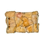 Top-down view of large golden brown agate serving tray with mosaic amber and cream stone slabs and two gold bar handles