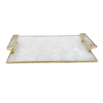 Full overhead view of white crystal agate serving tray with clear quartz handles and gold frame, white background