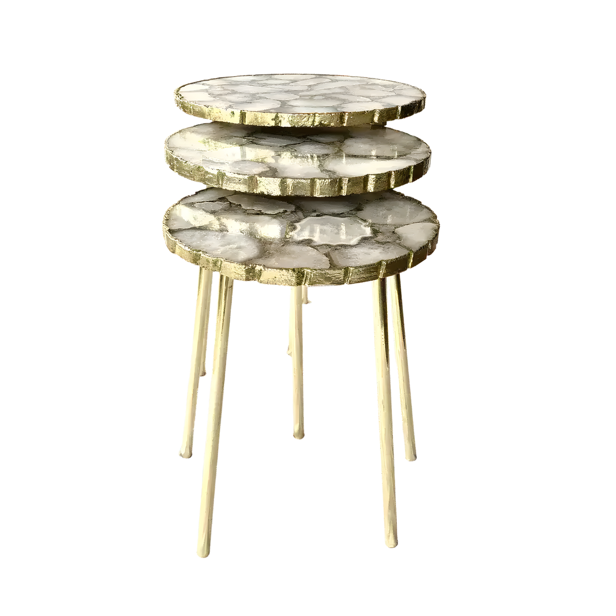 Three white crystal agate round nesting tables stacked in graduated sizes, each with gold-rimmed edges and gold hairpin legs