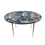Oval agate gemstone side table, blue-grey mosaic agate top with banded concentric patterns and white centres on four slim gold legs