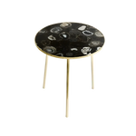 Black agate round coffee accent table — circular black agate slab with swirling grey and white ring patterns on gold legs