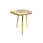 Full front view of rose quartz accent table with pale blush pink slab and gold rough mineral edge on three brass legs