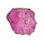 Top-down view of large pink agate cheese platter with vivid fuchsia-pink translucent surface and gold-plated edge