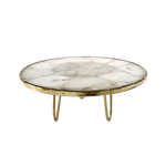 White crystal agate cake stand, round milky-white agate disc with soft grey veining and thin gold rim on three brass hairpin legs