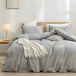 Create a serene and cozy retreat with our 100% Cotton Duvet Cover Set in a soft light gray, complemented by a matching Cotton Sheet Set. Made from premium 100% cotton, this bedding set offers a luxurious, breathable feel that ensures a comfortable night's sleep all year round. The soothing light gray color adds a touch of modern elegance to any bedroom, creating a peaceful atmosphere perfect for rest and relaxation.