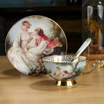 Heavenly blue bone china tea cup with saucer — gold footed base, Rococo couple on saucer, gold handle