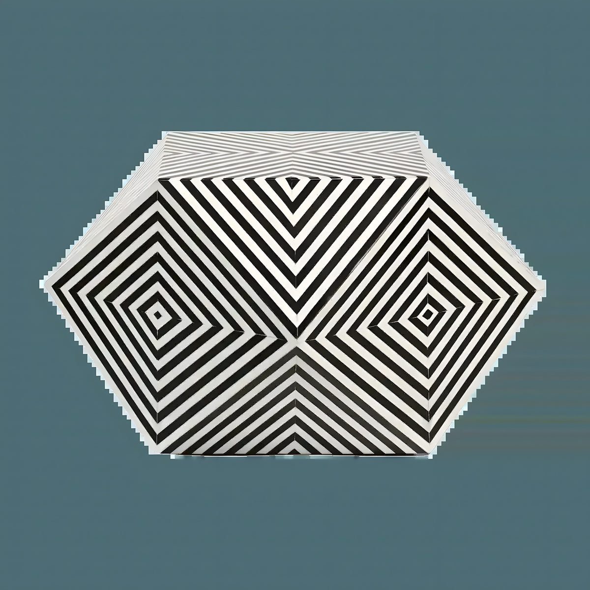 Bone inlay coffee table, hexagonal top with bold black and white concentric diamond geometric stardom pattern, gray background