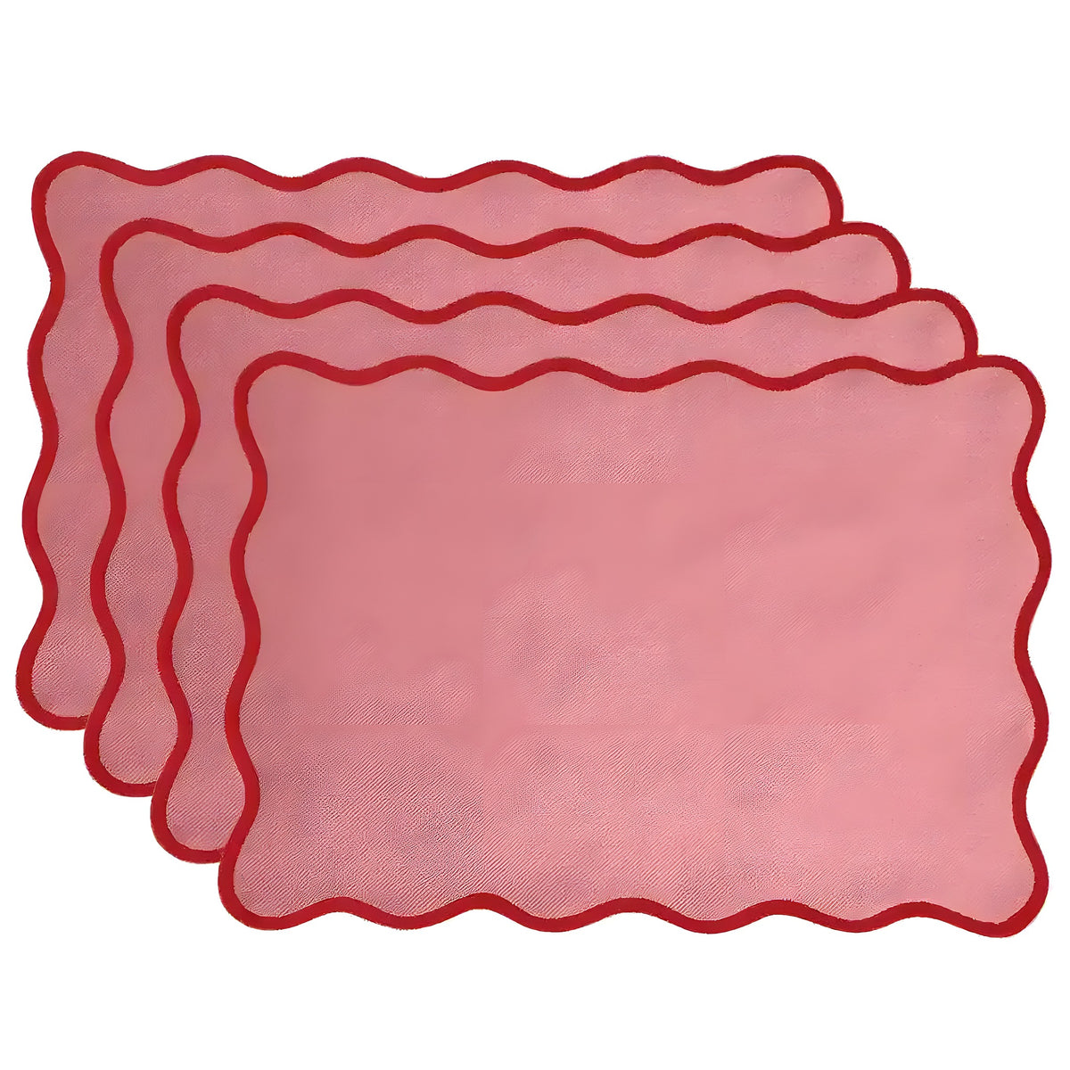 Set of four pink cotton rectangular placemats with red wavy scallop border, stacked in fanned arrangement