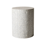 Gray floral motif bone inlay round drum side table covered in white vine and leaf bone inlay on gray ground, full height view