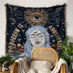 Tomorrow is Another Day woven cotton throw hung as tapestry — dark navy with blue-haired woman, gold eye-sun and star motifs