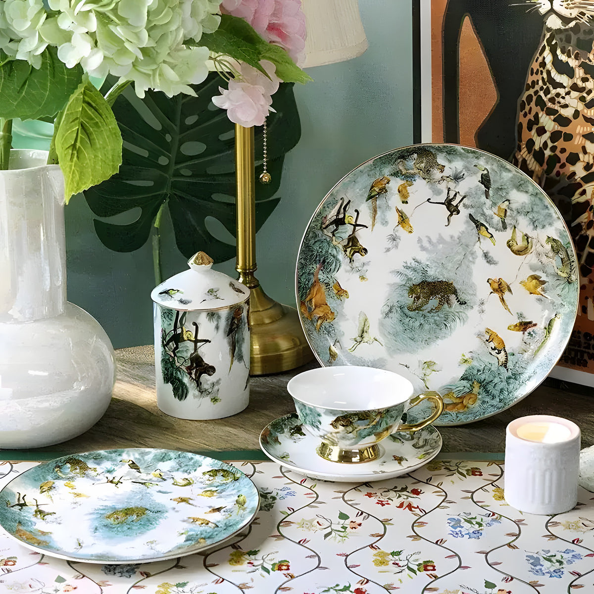 Jungle Leopard and Monkey bone china set — plate, teacup, jar with monkey and leopard motif, styled on wood surface