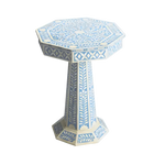 Blue floral bone inlay pedestal side table, octagonal top with white floral pattern on blue, tapered column base on grey background