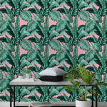 Tropical monstera wallpaper installed in room with concrete bench and plant, dense green leaf pattern on pink background