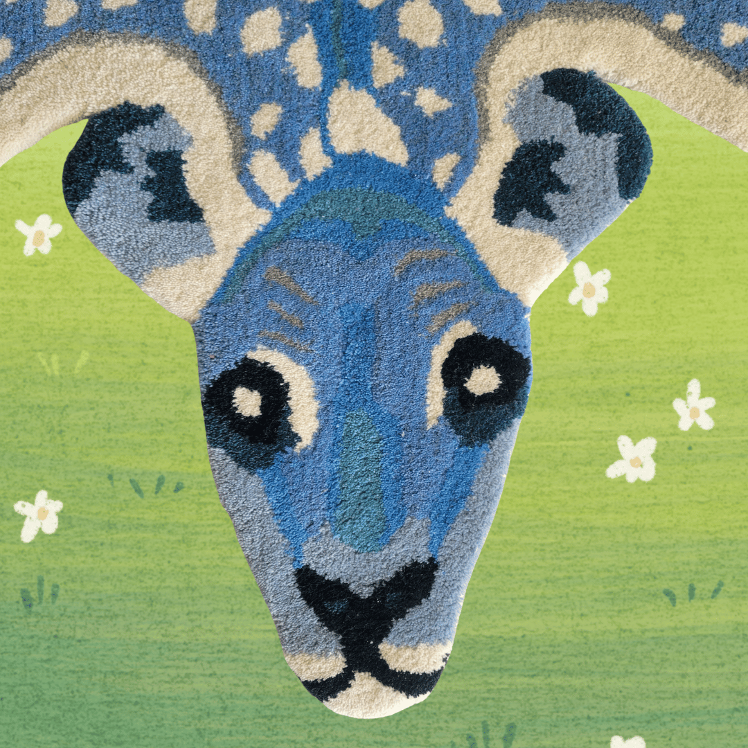 This is a hand-tufted wool rug featuring a design of deer amidst a dark blue background. The rug is made from high-quality wool, providing durability and softness underfoot. The design adds a touch of nature-inspired elegance to any room. Ideal for those seeking a cozy and stylish addition to their living space.