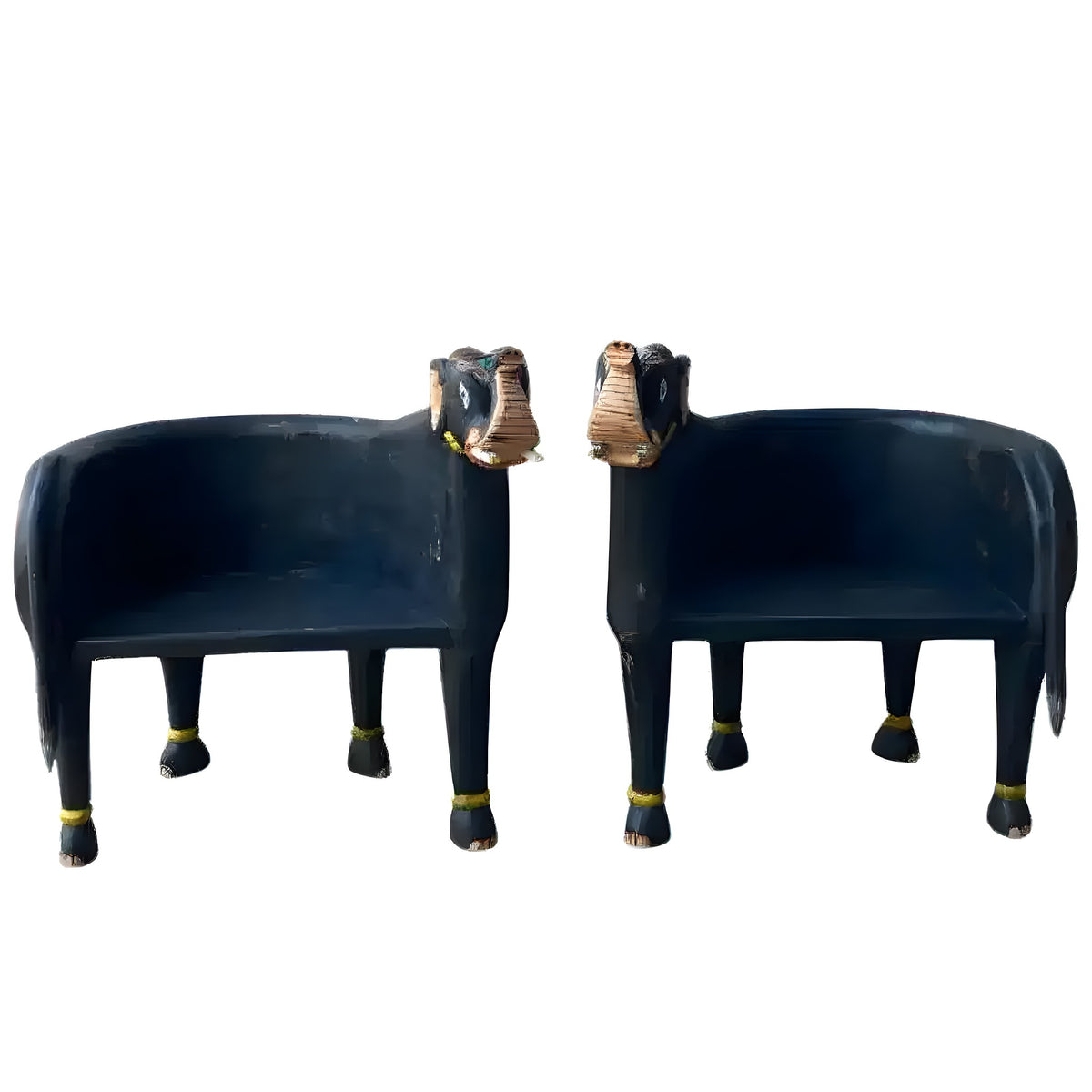 Pair of hand crafted wooden elephant Maharaja chairs in dark navy with gold anklets and carved elephant head backs, front view.