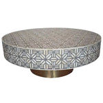 Grey spider bone inlay coffee table, round low form with grey and cream geometric star lattice, brass pedestal base