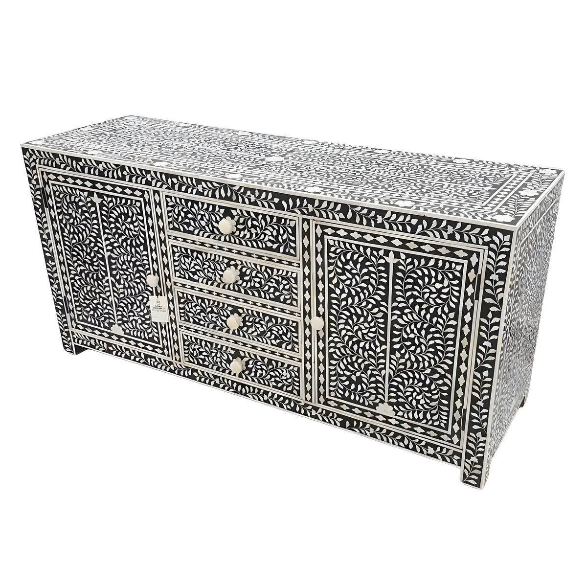 Moroccan bone inlay 6 drawers chest in black with dense white floral vine pattern covering all surfaces
