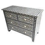 Targua bone inlay chest of 4 drawers, black ground with white star and quatrefoil mosaic pattern, brass circular knob pulls