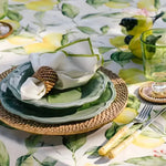 lemonade love placemat round rattan on lemon botanical tablecloth green ceramic plates white napkin green glass bamboo cutlery