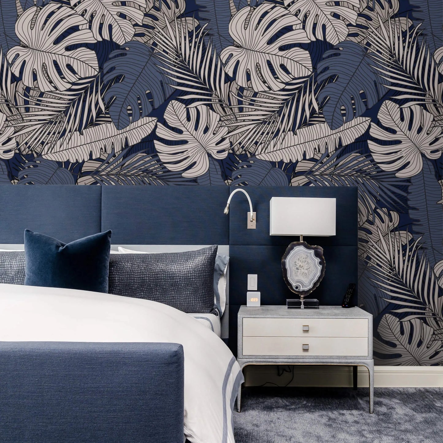 Tropical Midnight Leaves Wallpaper: Embrace the allure of the night with this mesmerizing design, featuring lush tropical leaves against a midnight backdrop, evoking a sense of mystery and sophistication in any room.