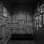 Black & Bold Bends Art Deco Wallpaper styled in a room setting