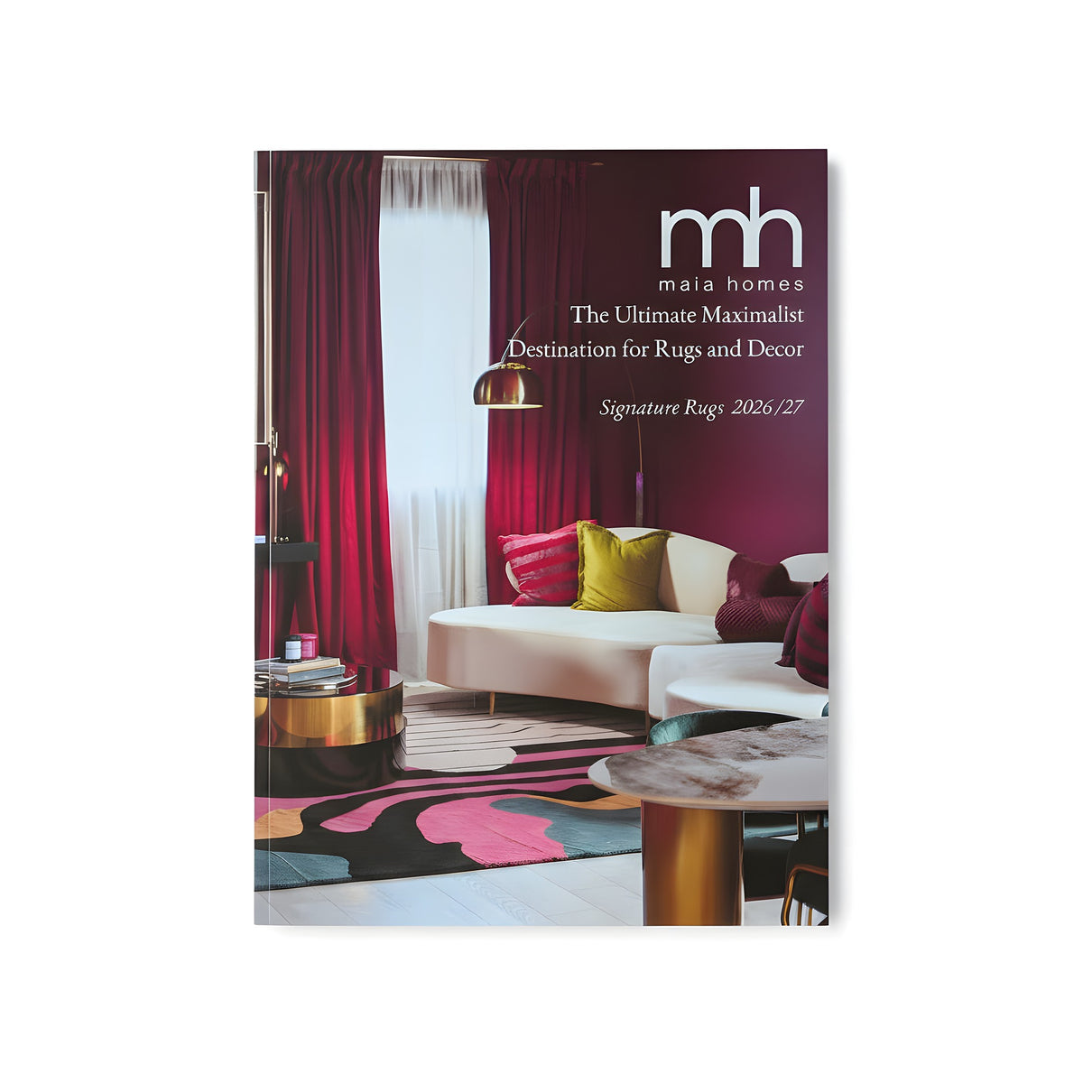 Maia Homes catalog cover with a living room scene featuring a sofa, rug, and decor items.