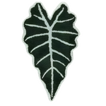 Black and white leaf-shaped rug on a white background