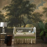Children's room with a crib against a scenic wall mural