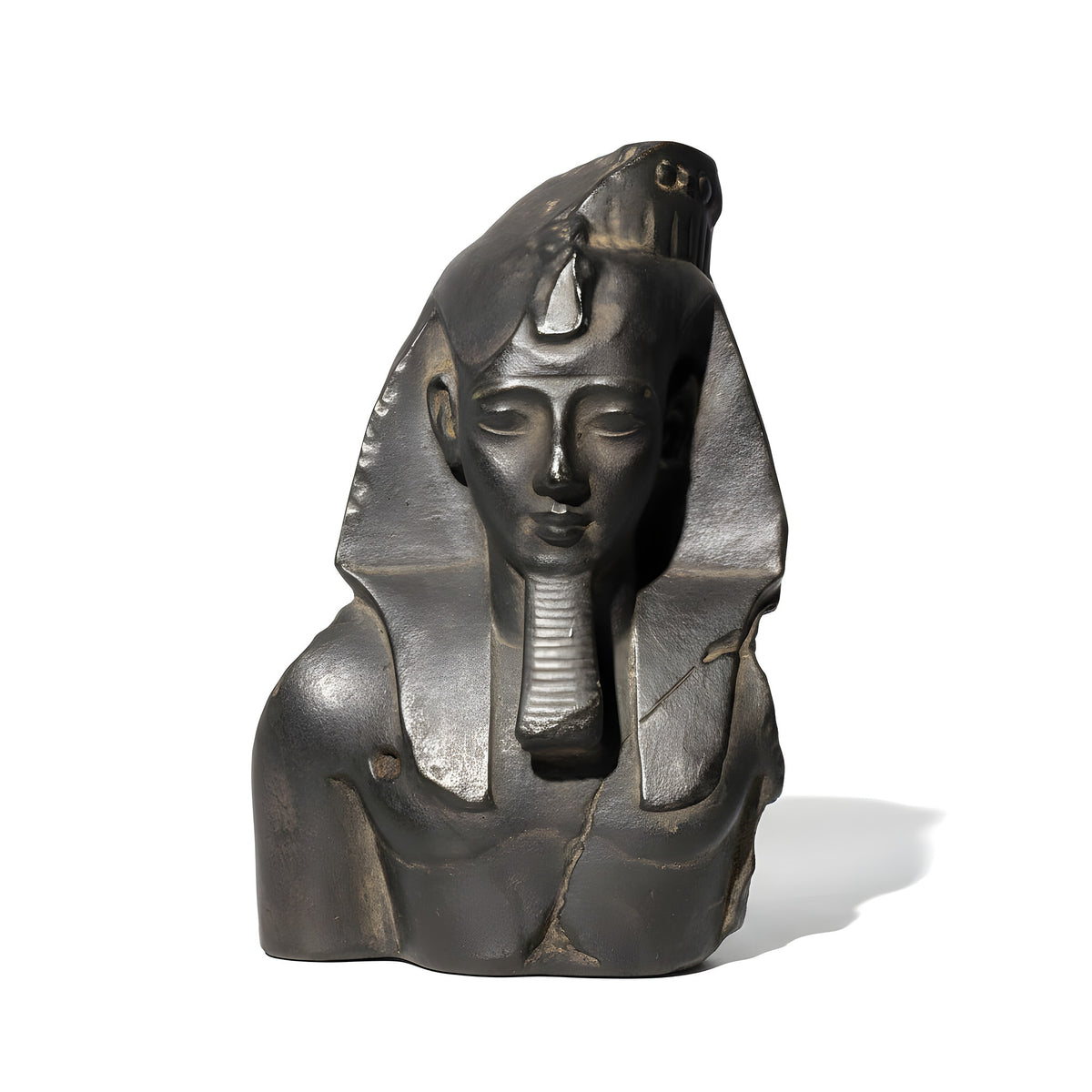 Bronze statue of a pharaoh with a headdress on a white background