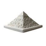 White pyramid sculpture on a gray background
