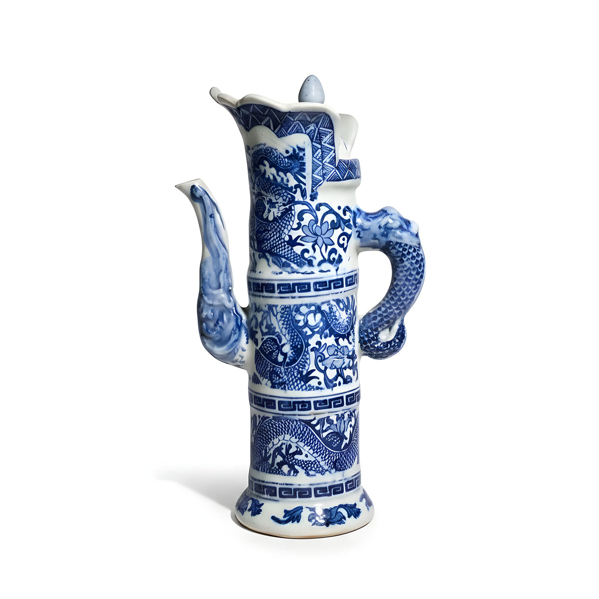Blue and white ceramic vase with dragon design on a black background