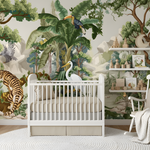 Children's room with jungle-themed wallpaper, crib, and rocking chair.