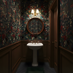Decorative bathroom with floral wallpaper, a white sink, and a round mirror.