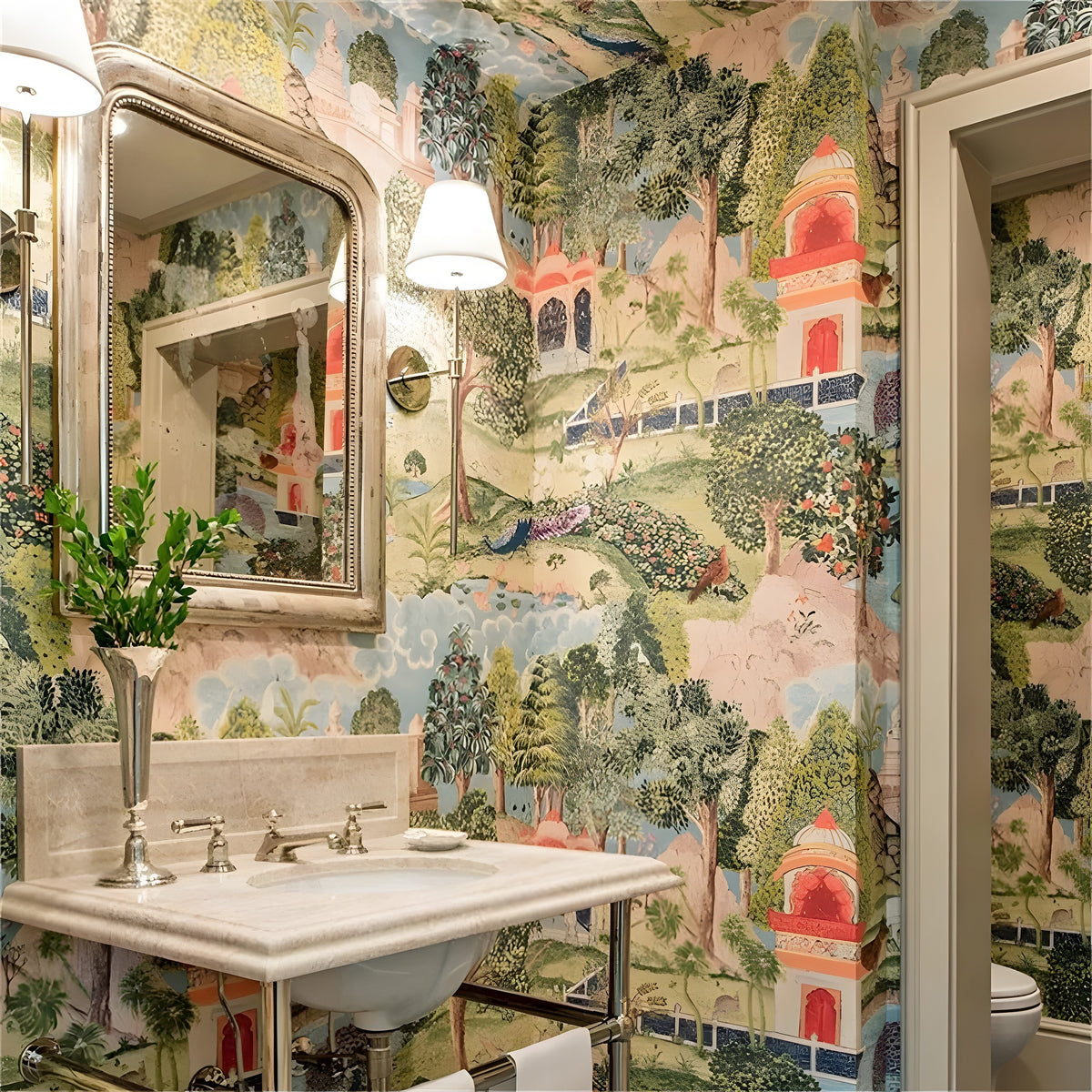 Bathroom with decorative wallpaper featuring a landscape scene, sink, and mirror.