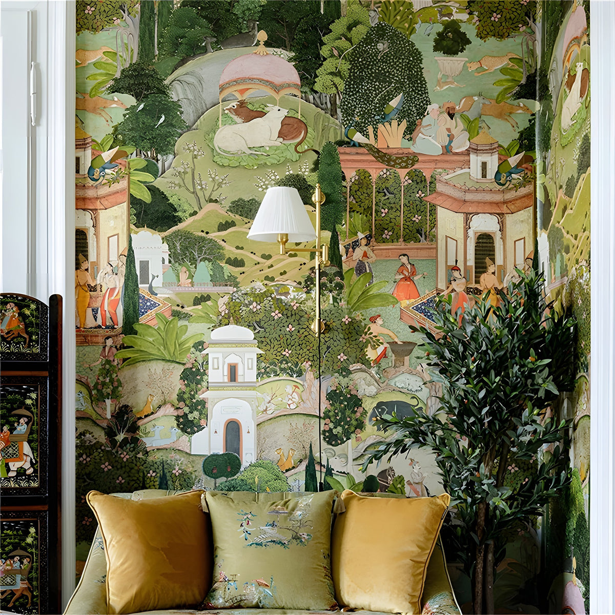 Decorative wallpaper with a garden scene, yellow cushions on a sofa, and a lamp.