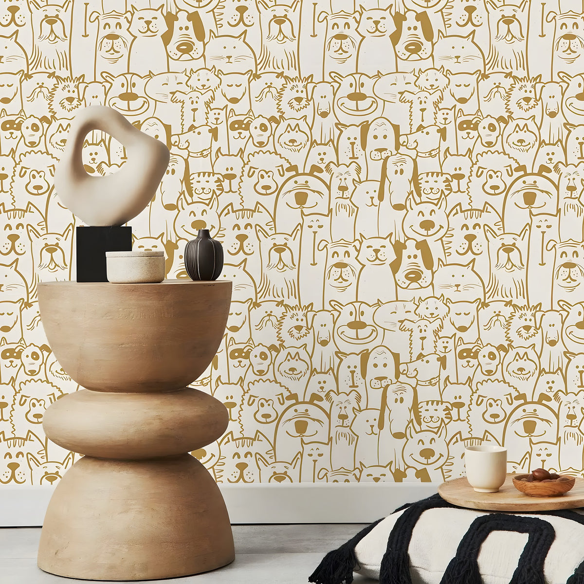 Decorative table with sculptures against a wallpaper with animal patterns