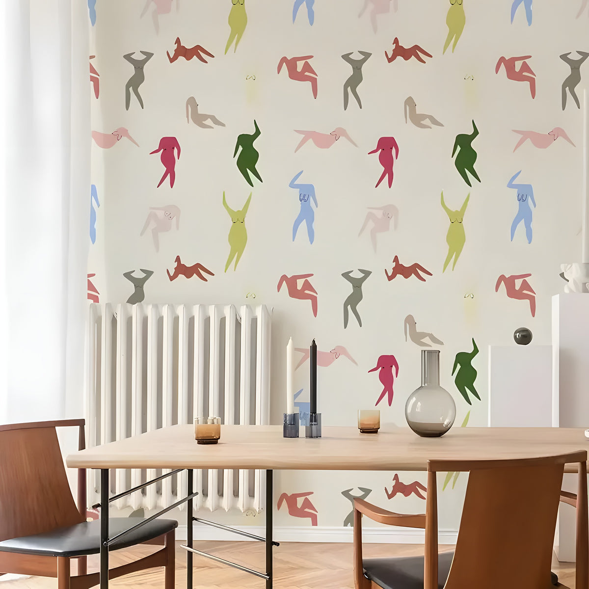Dining room with colorful abstract figures on the wall