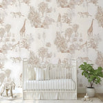 Nursery room with crib and animal-themed wallpaper