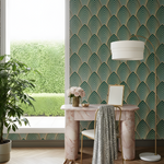 Modern interior with green patterned wallpaper, marble desk, and plant.