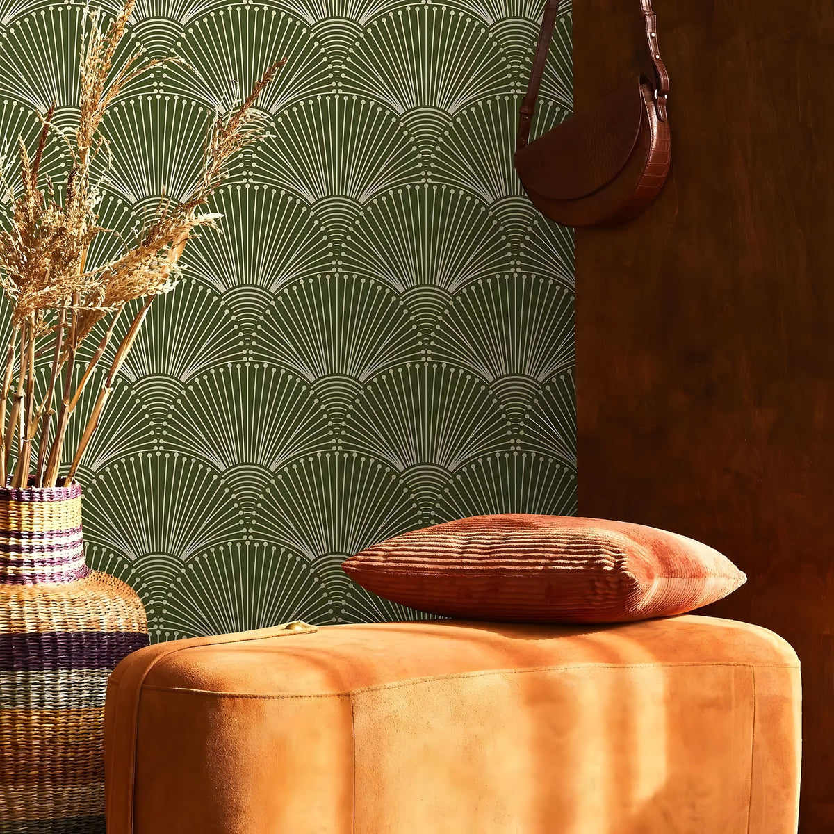 Decorative pillow on a textured surface with a patterned wall in the background