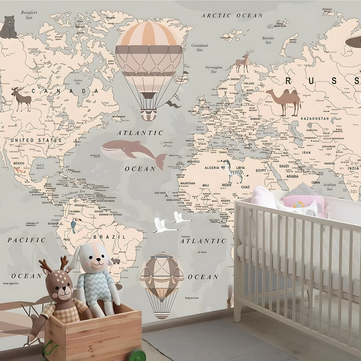 World map wallpaper in a nursery with a crib and toys.