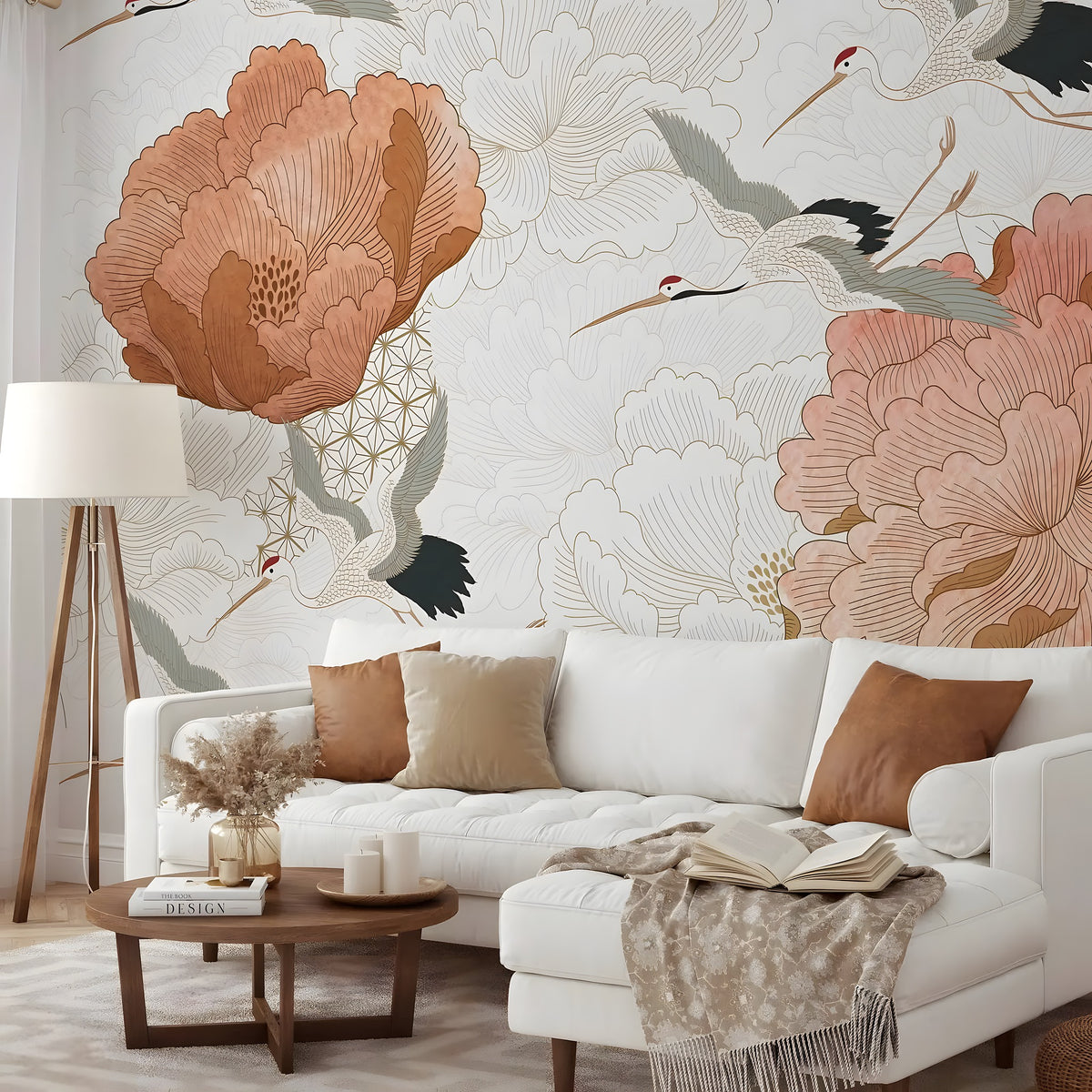 Living room with floral and crane wallpaper, white sofa, and wooden coffee table.